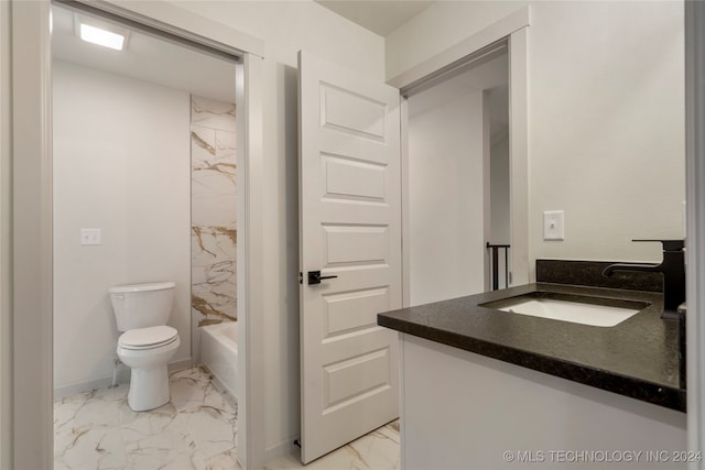 full bathroom featuring vanity, toilet, and tiled shower / bath combo