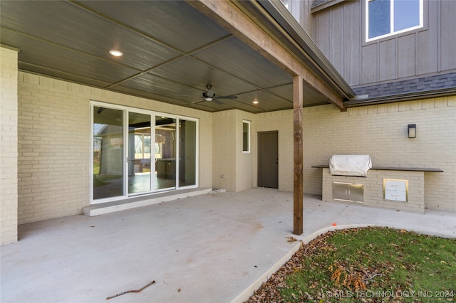 view of patio featuring ceiling fan