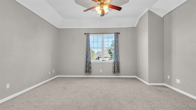 carpeted empty room with ceiling fan and lofted ceiling