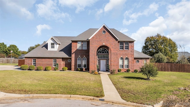 view of front of home featuring a front lawn