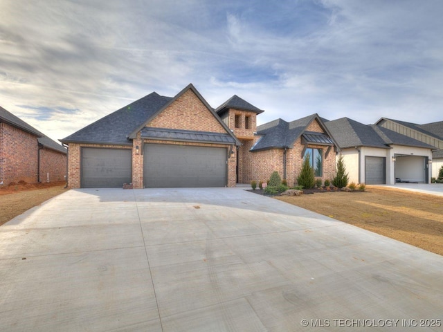 view of front of home with a garage