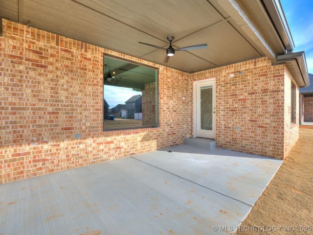 view of patio with ceiling fan