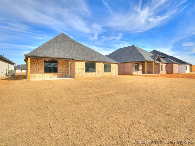 view of front of home with central air condition unit