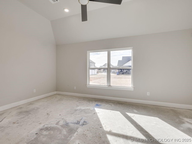 empty room featuring lofted ceiling and ceiling fan