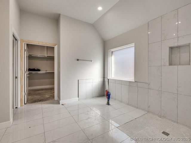 bathroom with vaulted ceiling