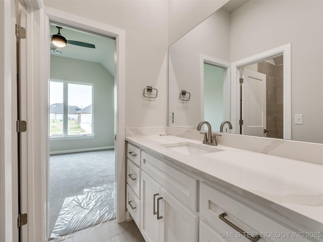 bathroom with tile patterned floors and vanity