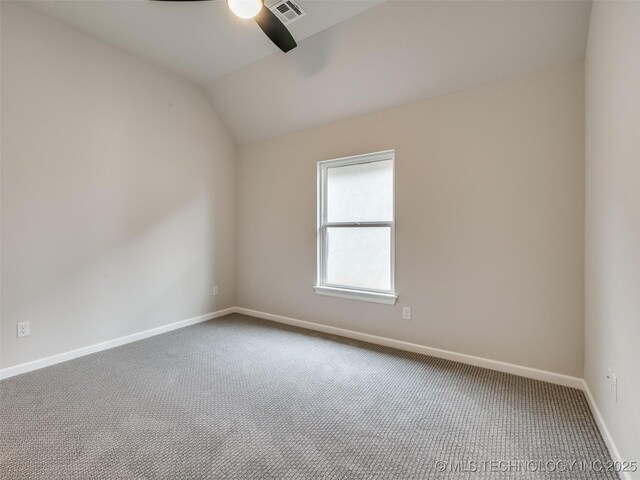 unfurnished room featuring visible vents, carpet flooring, baseboards, and ceiling fan