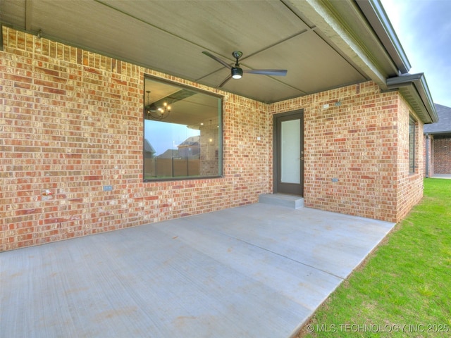view of patio featuring a ceiling fan