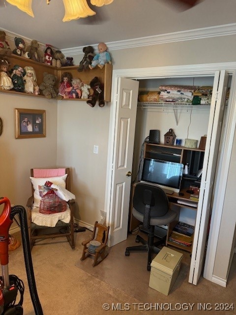 office area featuring carpet floors and crown molding