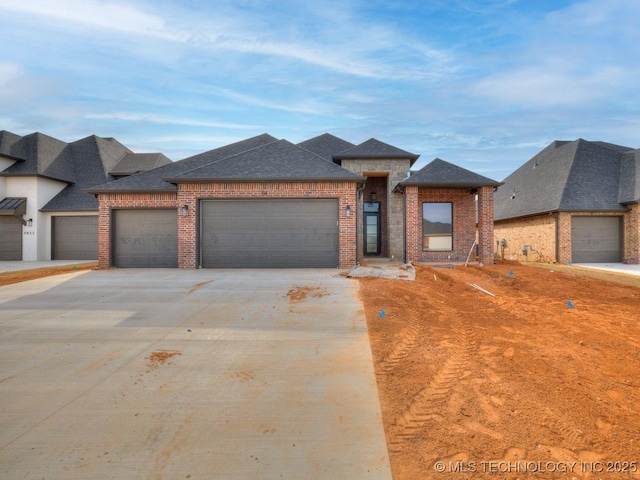 view of front of home with a garage