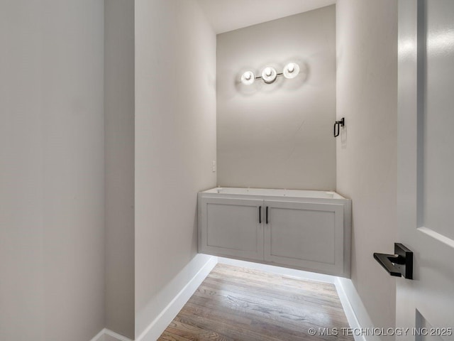 bathroom featuring hardwood / wood-style flooring