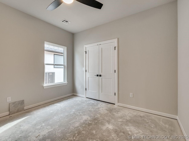 unfurnished bedroom featuring a closet and ceiling fan