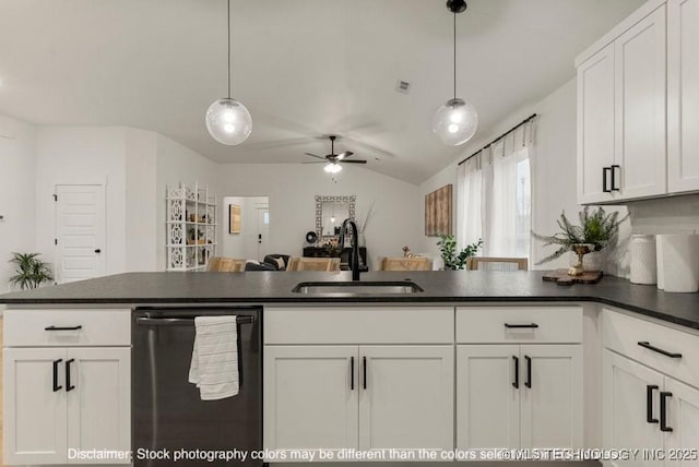 kitchen with dark countertops, black dishwasher, white cabinetry, and a sink