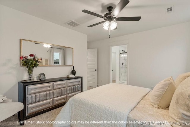 bedroom featuring ceiling fan, carpet floors, visible vents, and ensuite bathroom