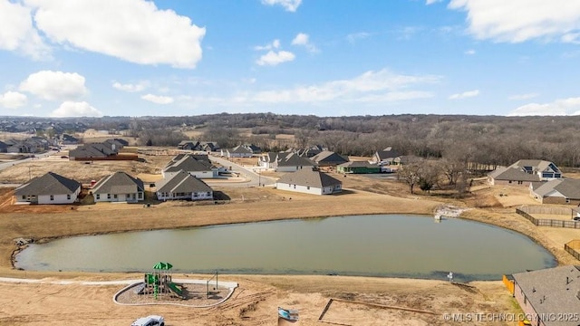 drone / aerial view featuring a water view