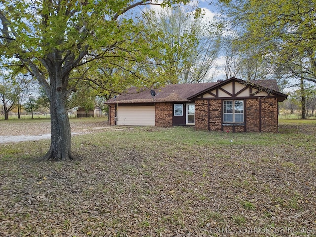 view of front of property featuring a garage