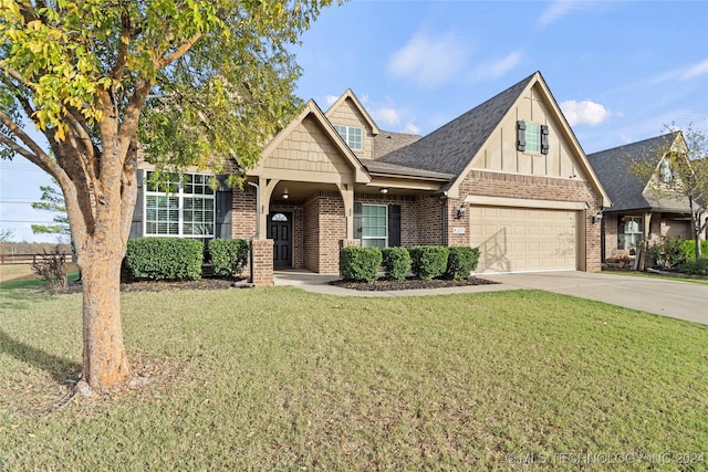 view of front of home with a garage and a front lawn