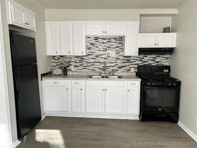 kitchen with black appliances, white cabinets, sink, and tasteful backsplash