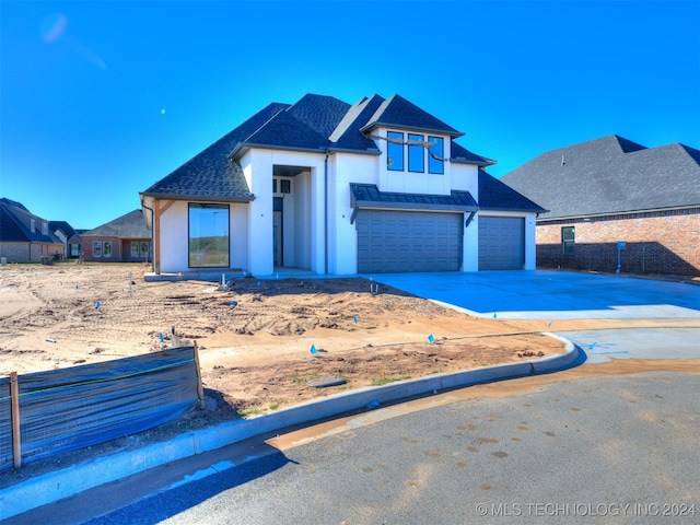 view of front facade featuring a garage