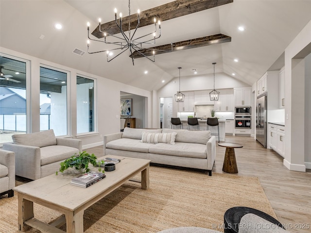 living room with ceiling fan, high vaulted ceiling, and light hardwood / wood-style flooring