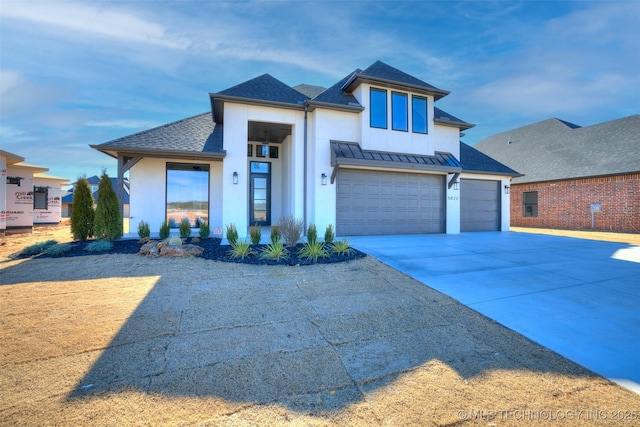 view of front of home with a garage