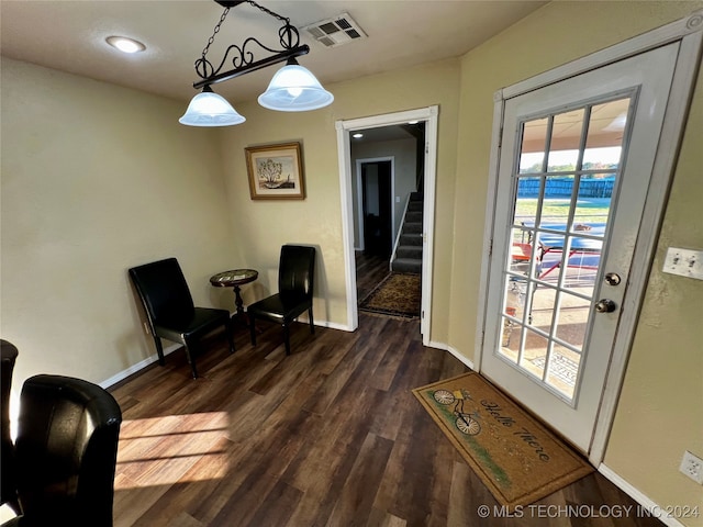 living area featuring dark wood-type flooring