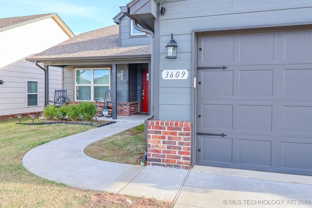 entrance to property featuring a garage