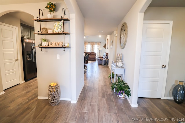 hall with dark hardwood / wood-style flooring