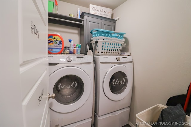 laundry room featuring washing machine and dryer