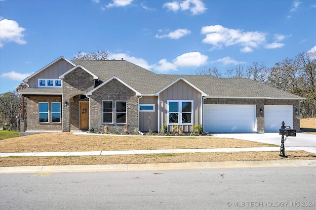 view of front of home with a garage