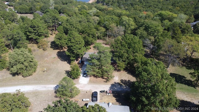 aerial view featuring a view of trees