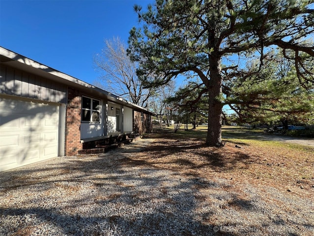 view of yard with an attached garage