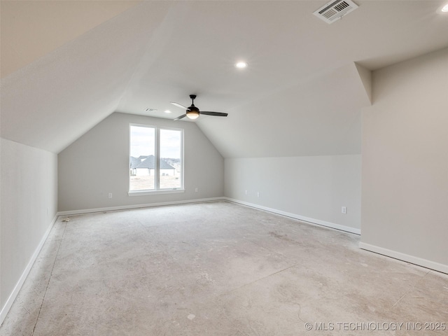 bonus room with ceiling fan and vaulted ceiling