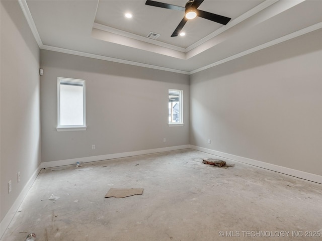 unfurnished room featuring a raised ceiling, ceiling fan, and crown molding