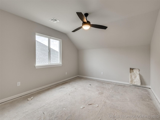 additional living space with ceiling fan and vaulted ceiling