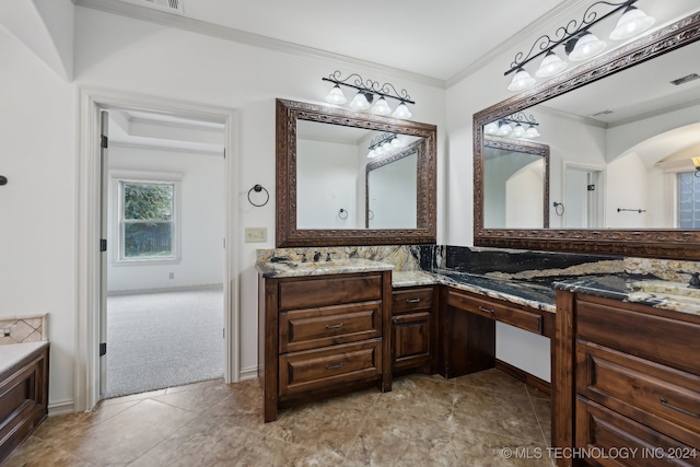 bathroom featuring vanity and ornamental molding