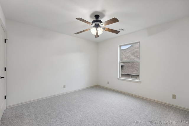 unfurnished room featuring carpet floors and ceiling fan