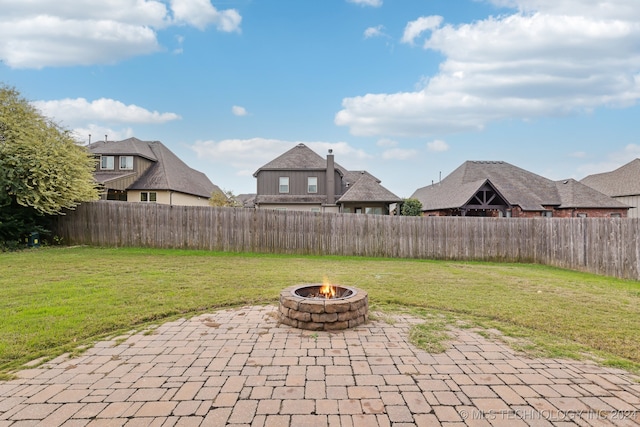 view of patio featuring an outdoor fire pit