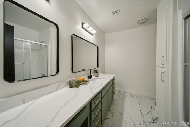 bathroom with vanity and walk in shower