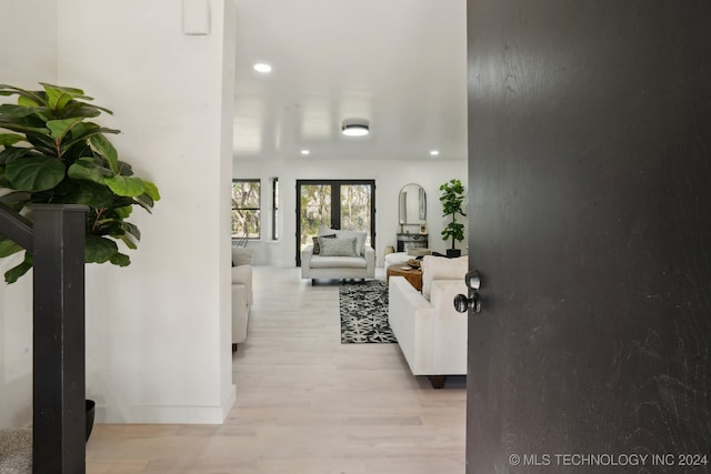 hallway with light wood-type flooring