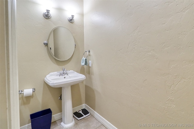 bathroom with tile patterned flooring