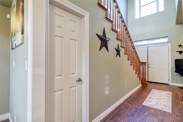 foyer featuring dark hardwood / wood-style floors