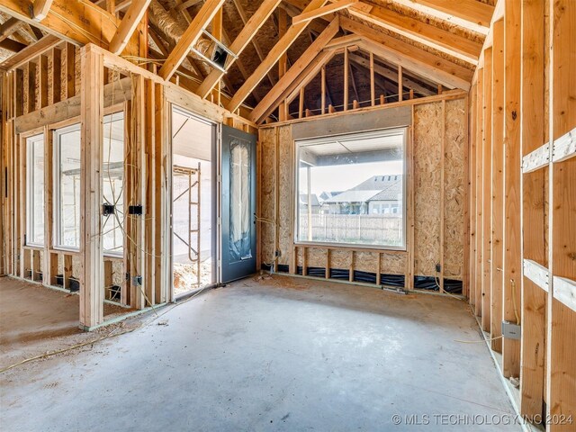 misc room with lofted ceiling