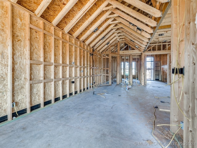 misc room with lofted ceiling