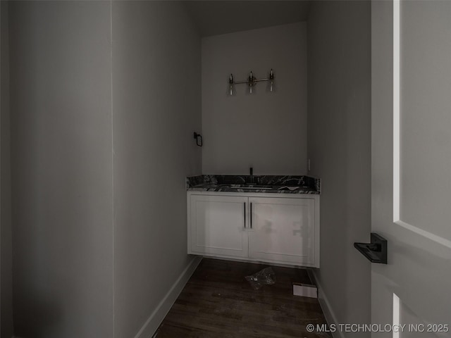 bathroom featuring vanity and hardwood / wood-style flooring