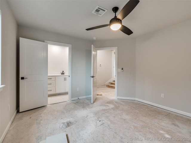 unfurnished bedroom with ceiling fan, ensuite bath, and sink