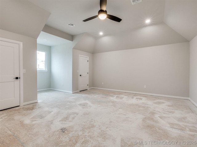 additional living space featuring ceiling fan and lofted ceiling