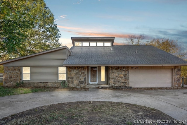 view of front of house with a garage