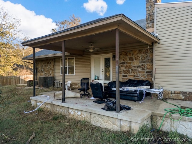 view of patio with ceiling fan and cooling unit