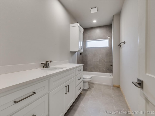 full bathroom with vanity, toilet, tiled shower / bath combo, and tile patterned flooring